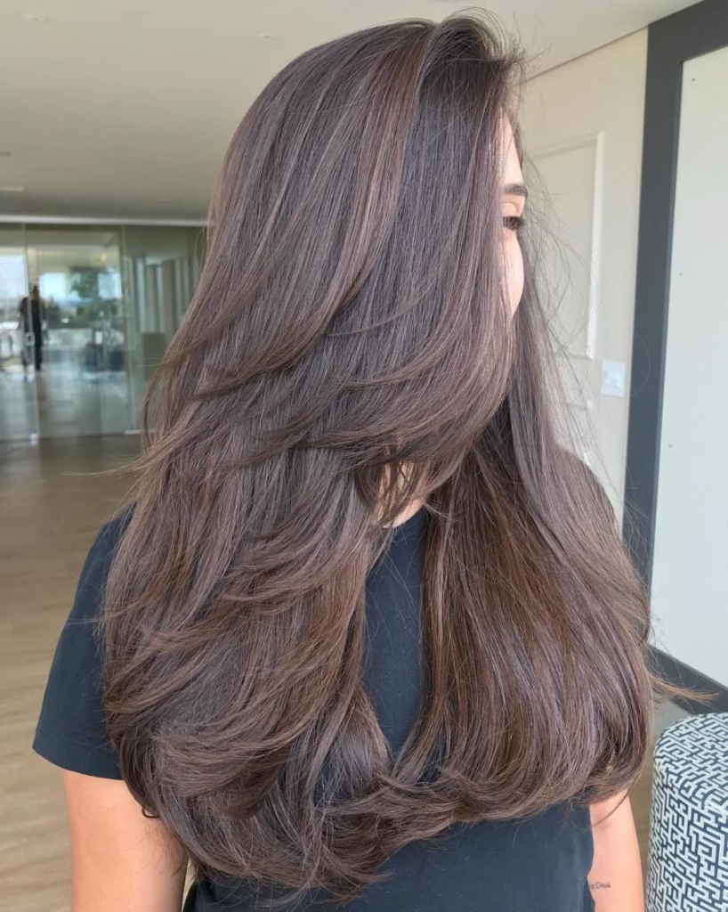 Wavy Lengths with Soft Blend U-Cut Layers and Black Color - The Latest  Hairstyles for Men and Women (2020) - Hairstyleology